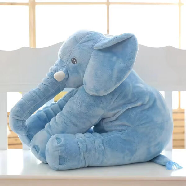Baby Elephant Stuffed Animal A blue baby elephant stuffed animal sitting.