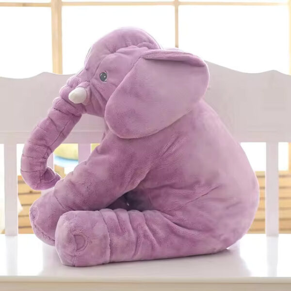 Baby Elephant Stuffed Animal A purple baby elephant stuffed animal sitting.