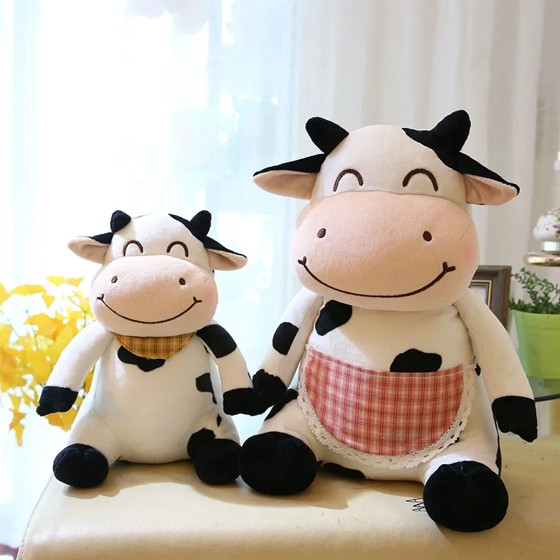 two cute cow stuffed animal toy