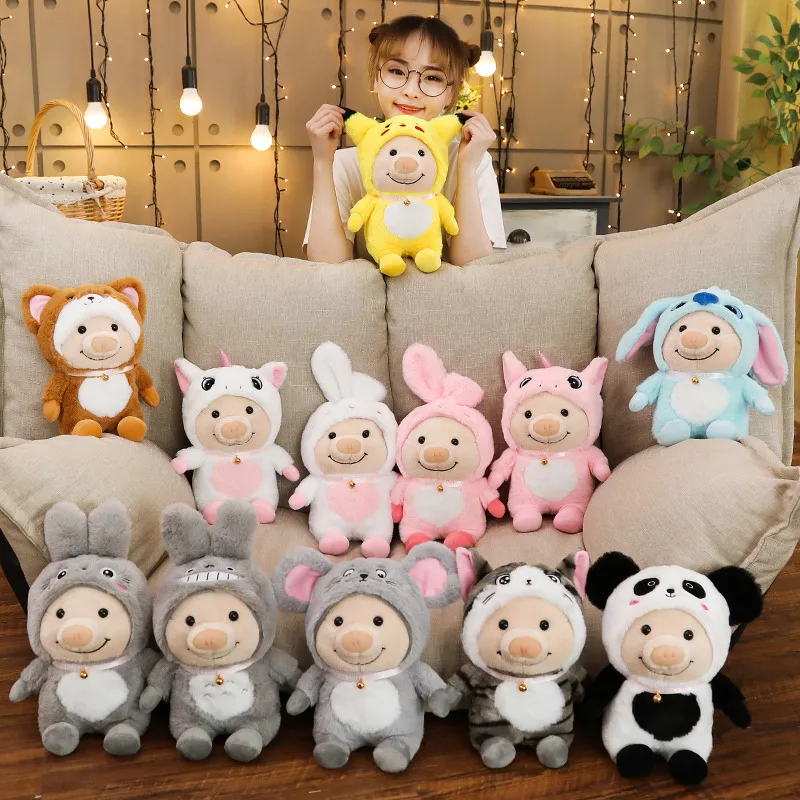 woman sitting beside all the design of cute pig plush