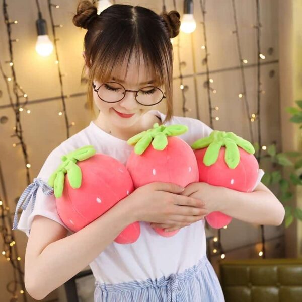 Cute Strawberry Plush Pillow Woman hugging 3 cute pink strawberry soft pillow