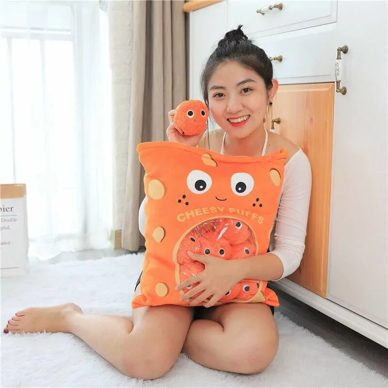 Woman hugging a cheese puff stuffed toy