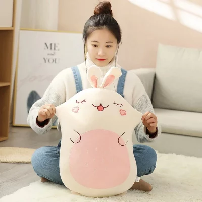 woman sitting beside different kawaii japanese squishmallows plush