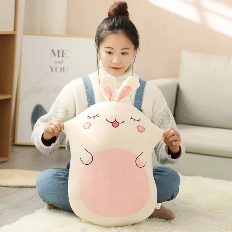 Top 300 Bunny Names: Cute, Funny & Good Names for Bunnies woman pinching a kawaii rabbit squishmallows plush