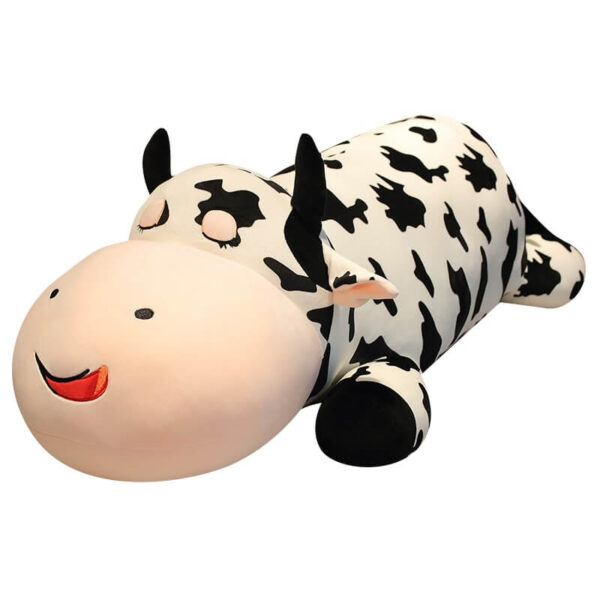 Giant Cow Stuffed Animal Lying Giant Cow plush in a white background