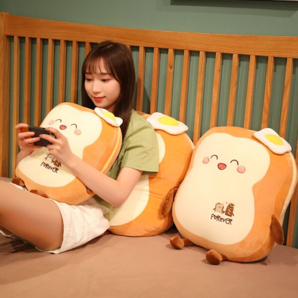 Kawaii Japanese Loaf Bread Plush Woman holding a phone while sitting on a Kawaii Japanese Loaf Bread Plush