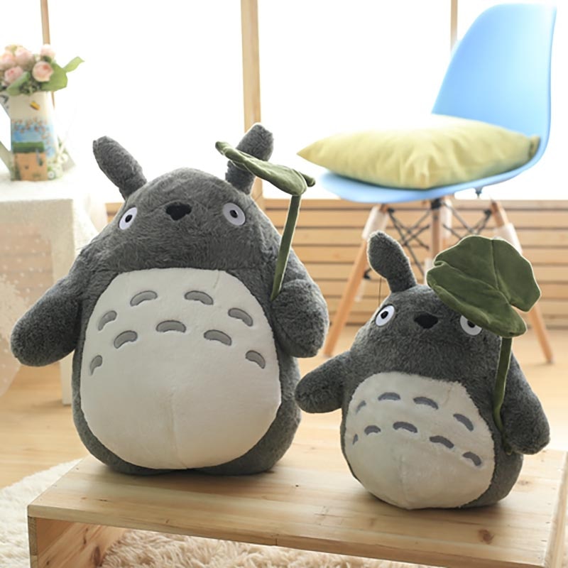 Japanese Animation Giant Totoro Plush holding a leaf and smiling