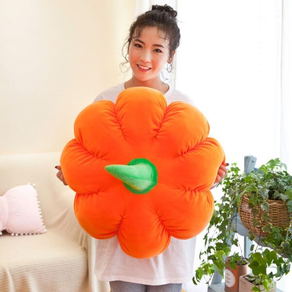 Plush Pumpkin Woman holding a Plush Pumpkin