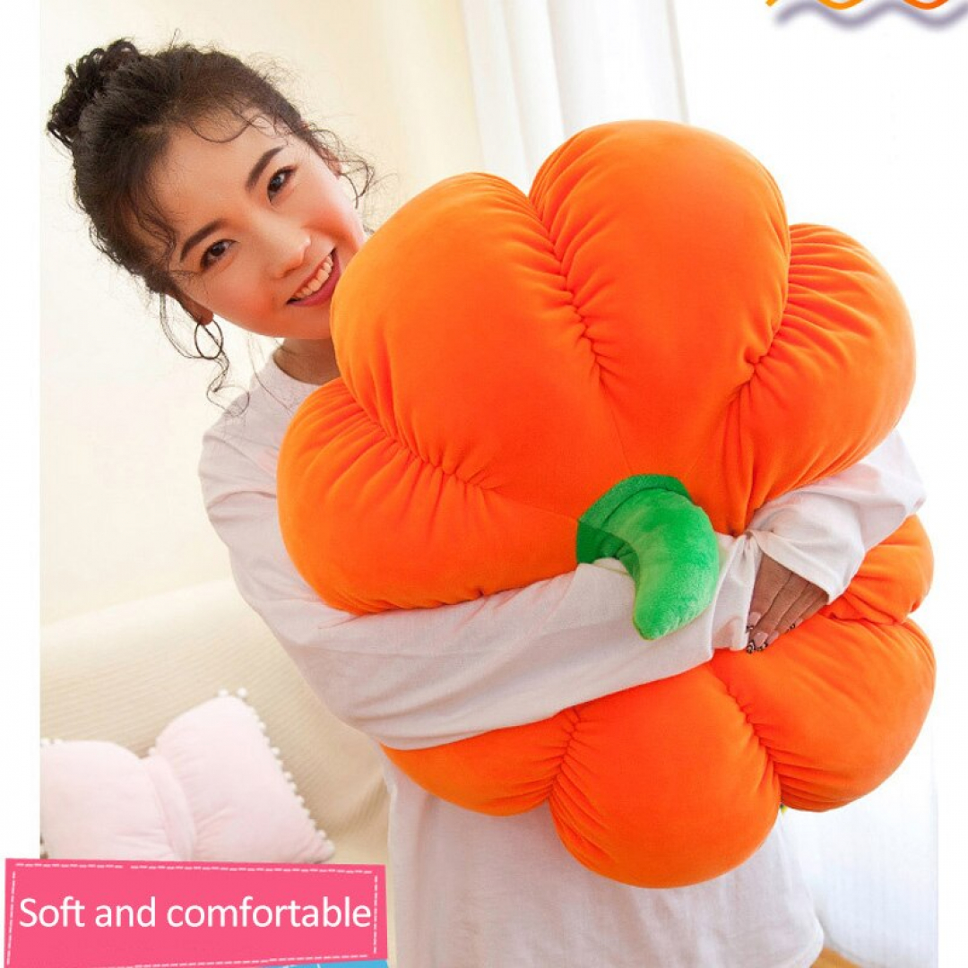 Woman hugging a Plush Pumpkin