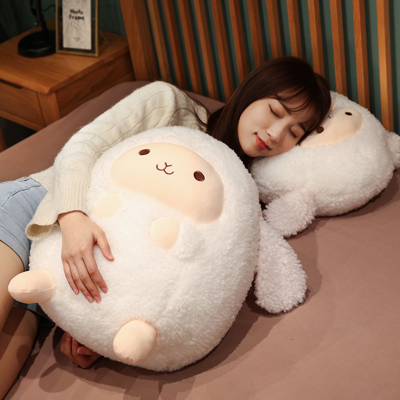 Woman sleeping beside kawaii sheep plush