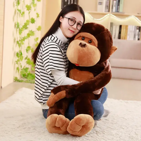 Kawaii Monkey A young woman hugging a large brown monkey plush toy in a warmly lit living room.