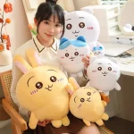 Woman holding different sizes of chiikawa hachiware and usagi plushies