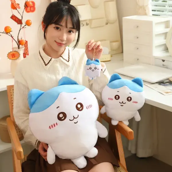 Giant Chiikawa Plush Woman Holding two sizes of Hachiware Plush