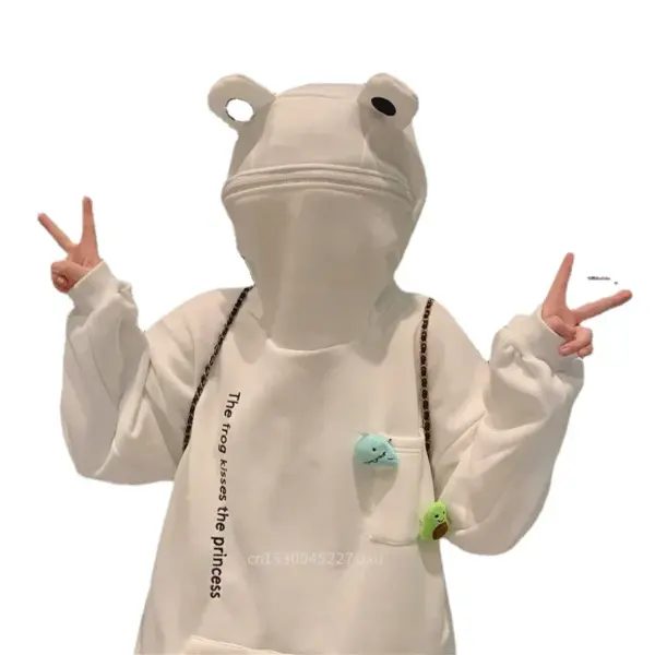 Frog Hoodie Woman wearing white frog hoodie with 3D eyes and zipped face