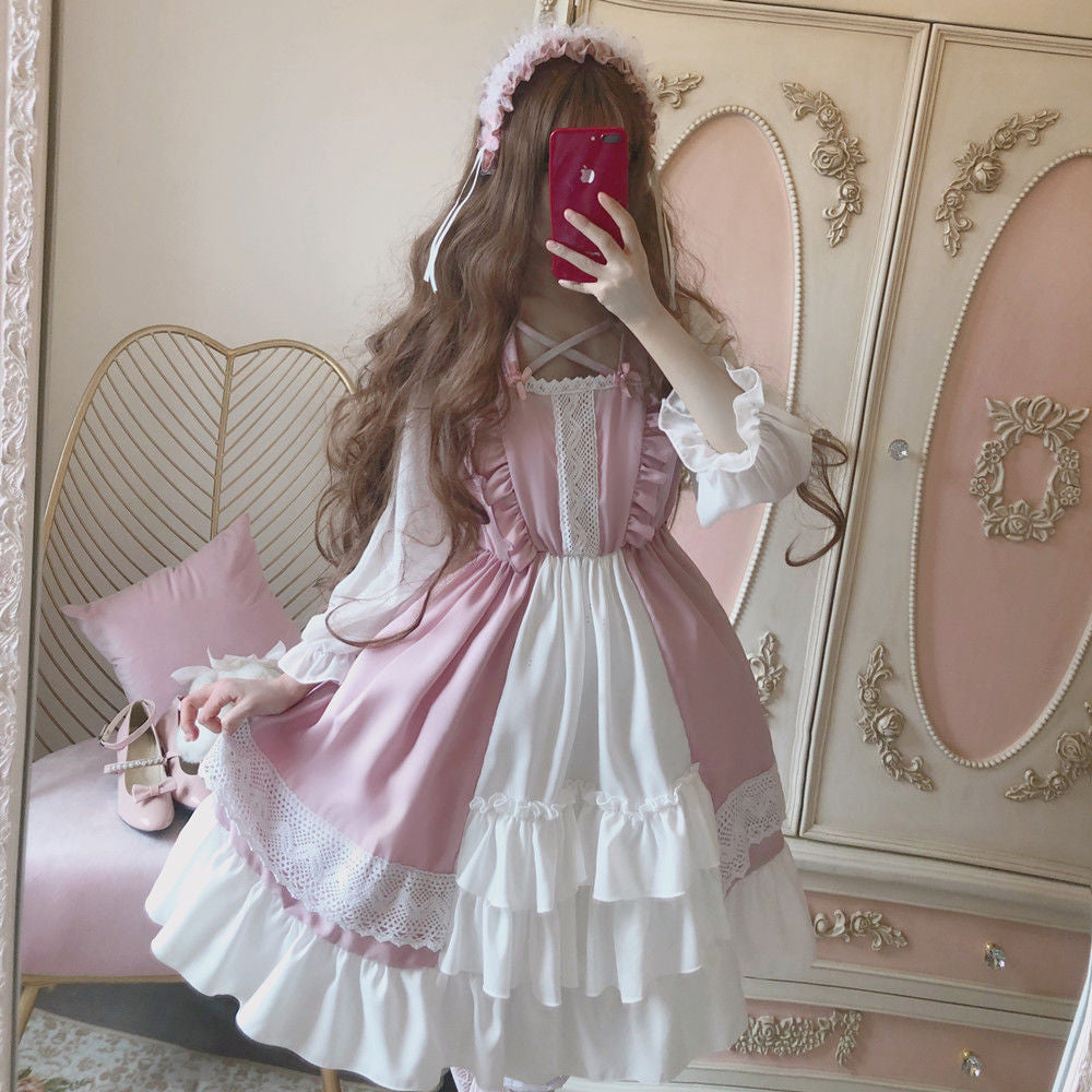 Elegant Victorian maid dress with puffy sleeves and layered skirt