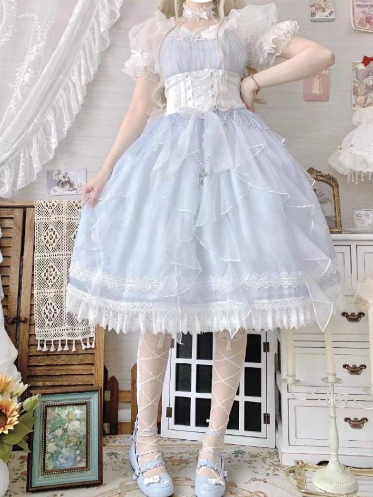 Light blue fairy princess dress with lace detailing and full skirt